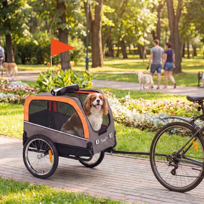 Dog bike trailer by Furr Baby Gifts, orange-gray pet cart with 20-inch air tires and flag on Tampa Home & Garden Store