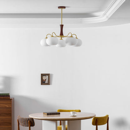 Chandelier Moktan Sabai Persimmon Glass with Brass Arms; white glass globes, wood-accent stem on Tampa Home & Garden Store