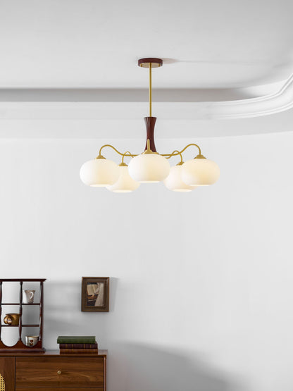 Persimmon Glass Chandelier with brass arms and wood accent stem; five frosted glass globes on Tampa Home & Garden Store