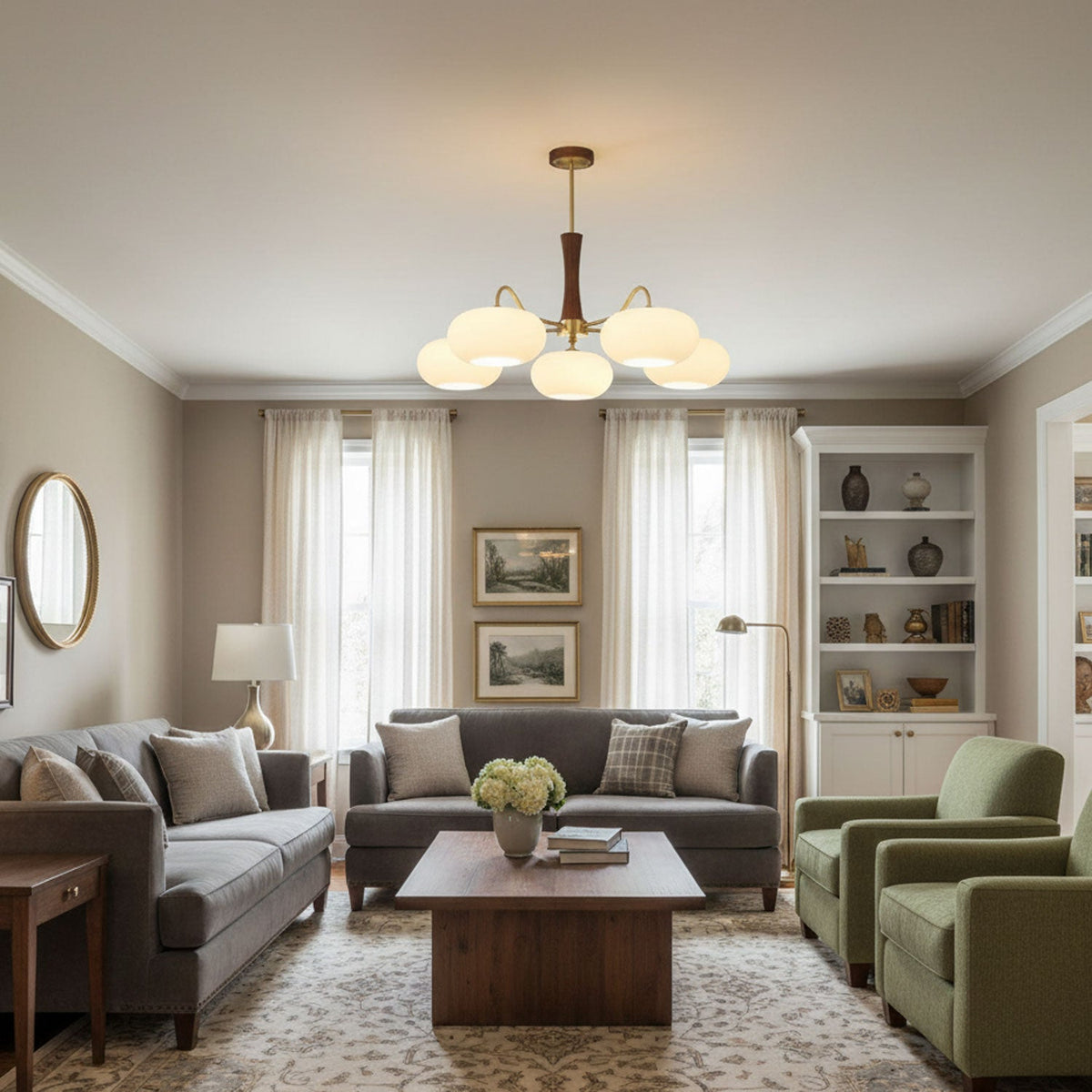 Persimmon glass chandelier with brass arms and wood accents in living room on Tampa Home & Garden Store