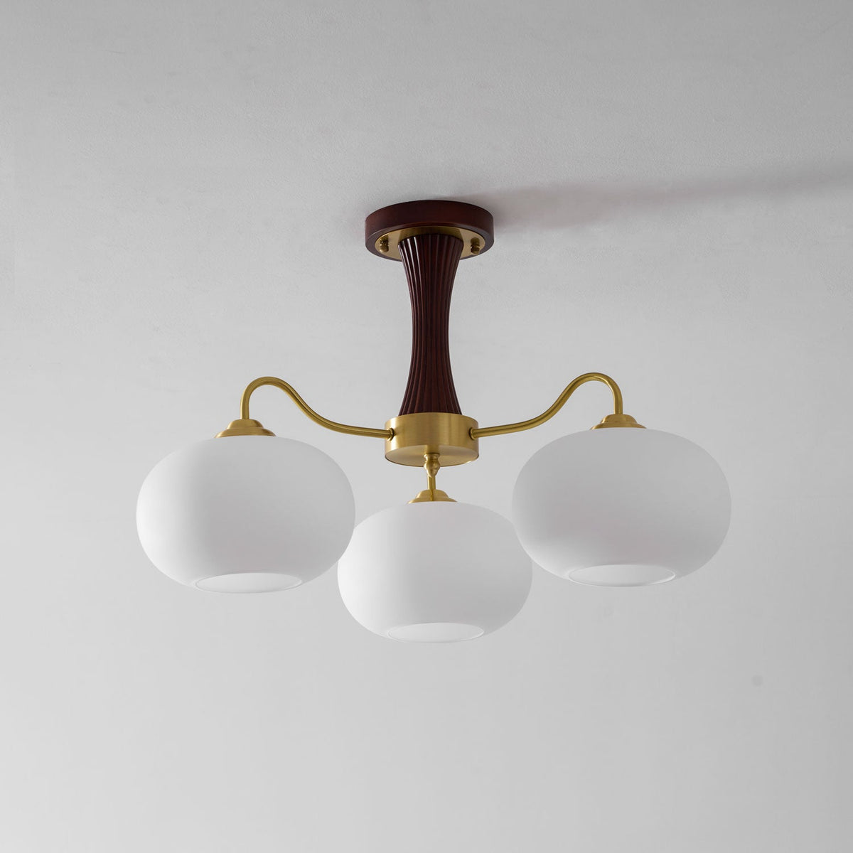 Persimmon glass chandelier with brass arms and wood-accent ceiling pendant light by Moktan Sabai on Tampa Home & Garden Store