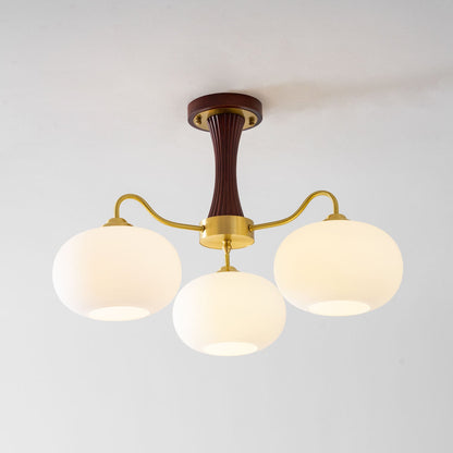 Persimmon Glass Chandelier with Brass Arms and wood accent stem, four frosted glass globes on Tampa Home & Garden Store
