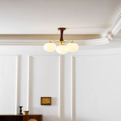 Persimmon Glass Chandelier with Brass Arms, three frosted globes, wood accent stem on Tampa Home & Garden Store