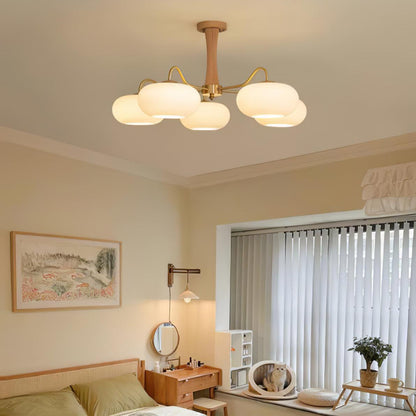 Persimmon glass chandelier with brass arms and wood-accent stem, ceiling pendant light on Tampa Home & Garden Store