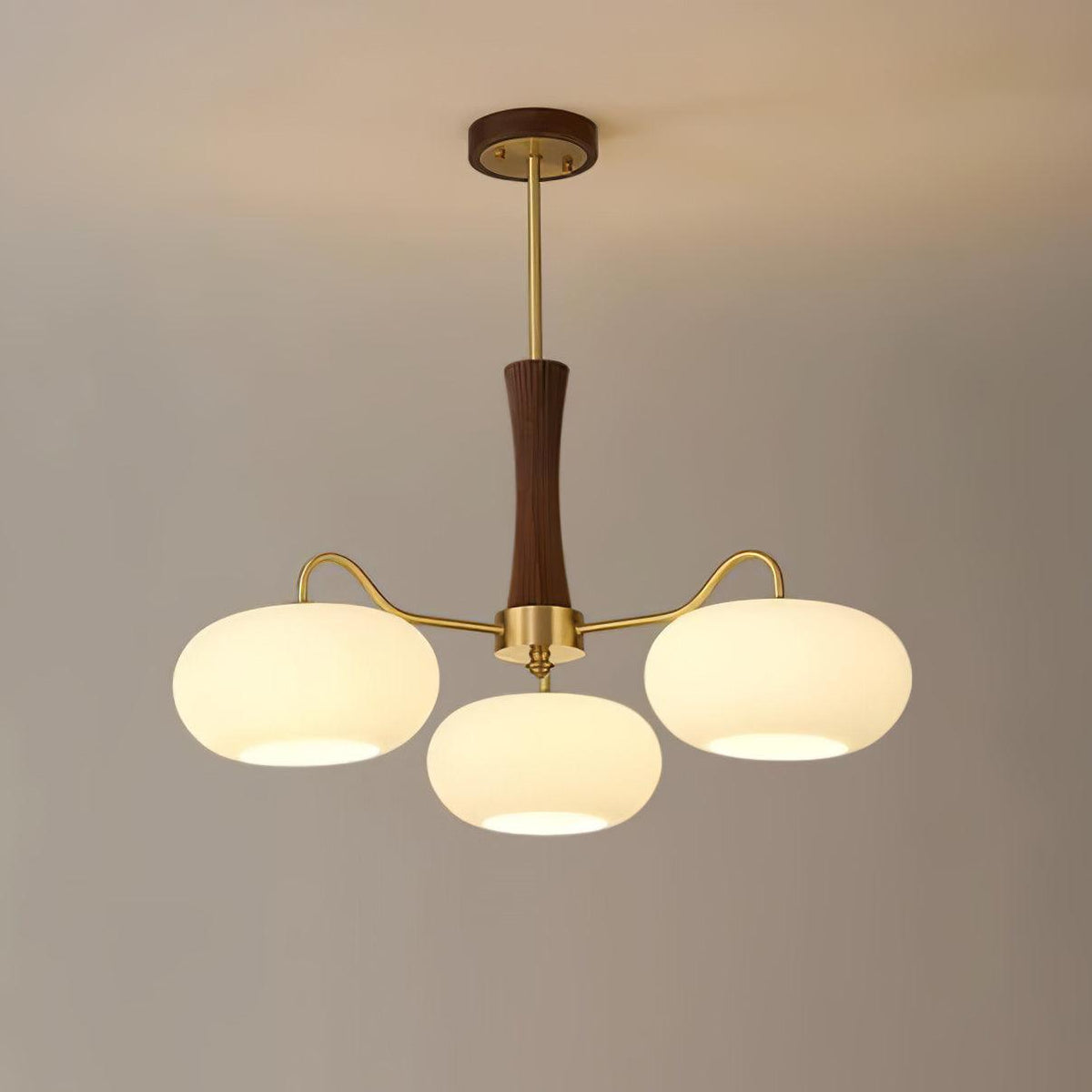 Persimmon Glass Chandelier by Moktan Sabai with wood-accent stem and brass arms, trio of globes on Tampa Home & Garden Store