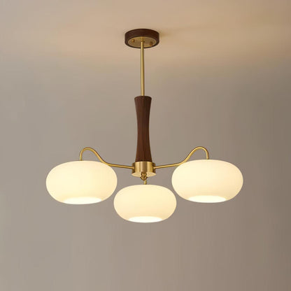 Persimmon Glass Chandelier by Moktan Sabai with wood-accent stem and brass arms, trio of globes on Tampa Home & Garden Store