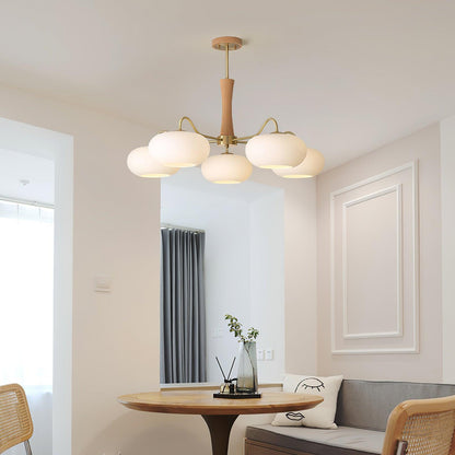 Moktan Sabai Persimmon Glass Chandelier with Brass Arms and Wood Accent, six white glass globes on Tampa Home & Garden Store