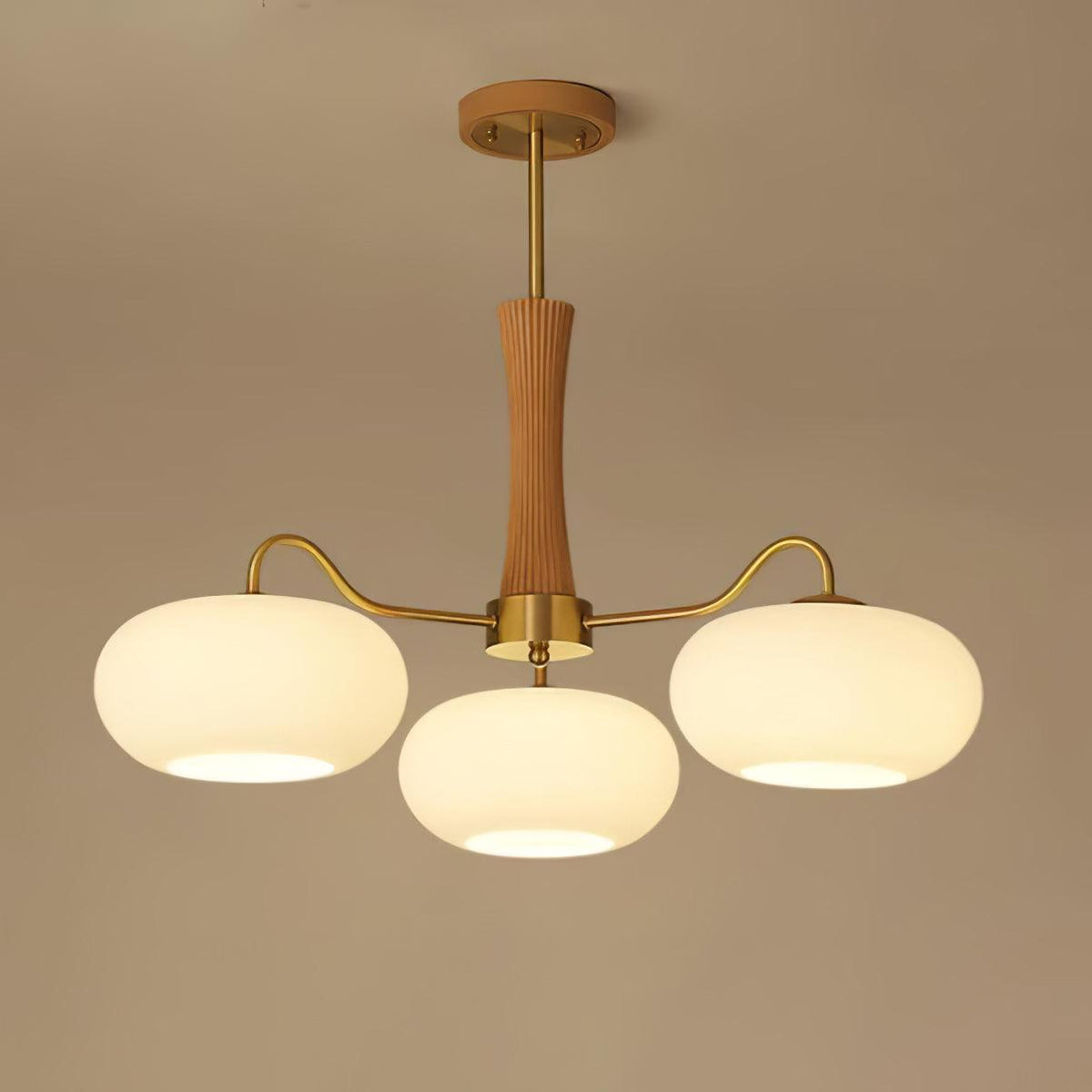Persimmon glass chandelier with brass arms and wood accent, three-globe ceiling pendant light by Moktan Sabai on Tampa Home & Garden Store