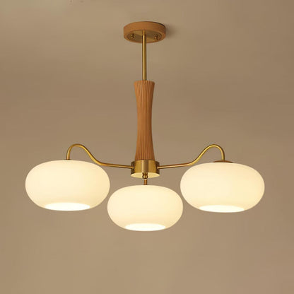 Persimmon glass chandelier with brass arms and wood accent, three-globe ceiling pendant light by Moktan Sabai on Tampa Home & Garden Store