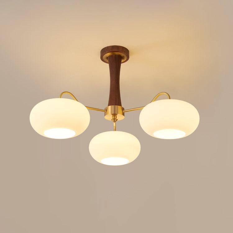 Persimmon glass chandelier with wood accent and brass arms Moktan Sabai three-globe on Tampa Home & Garden Store