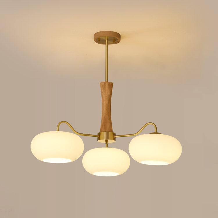 Persimmon Glass Chandelier with Brass Arms and Wood Accent, three globes by Moktan Sabai on Tampa Home & Garden Store