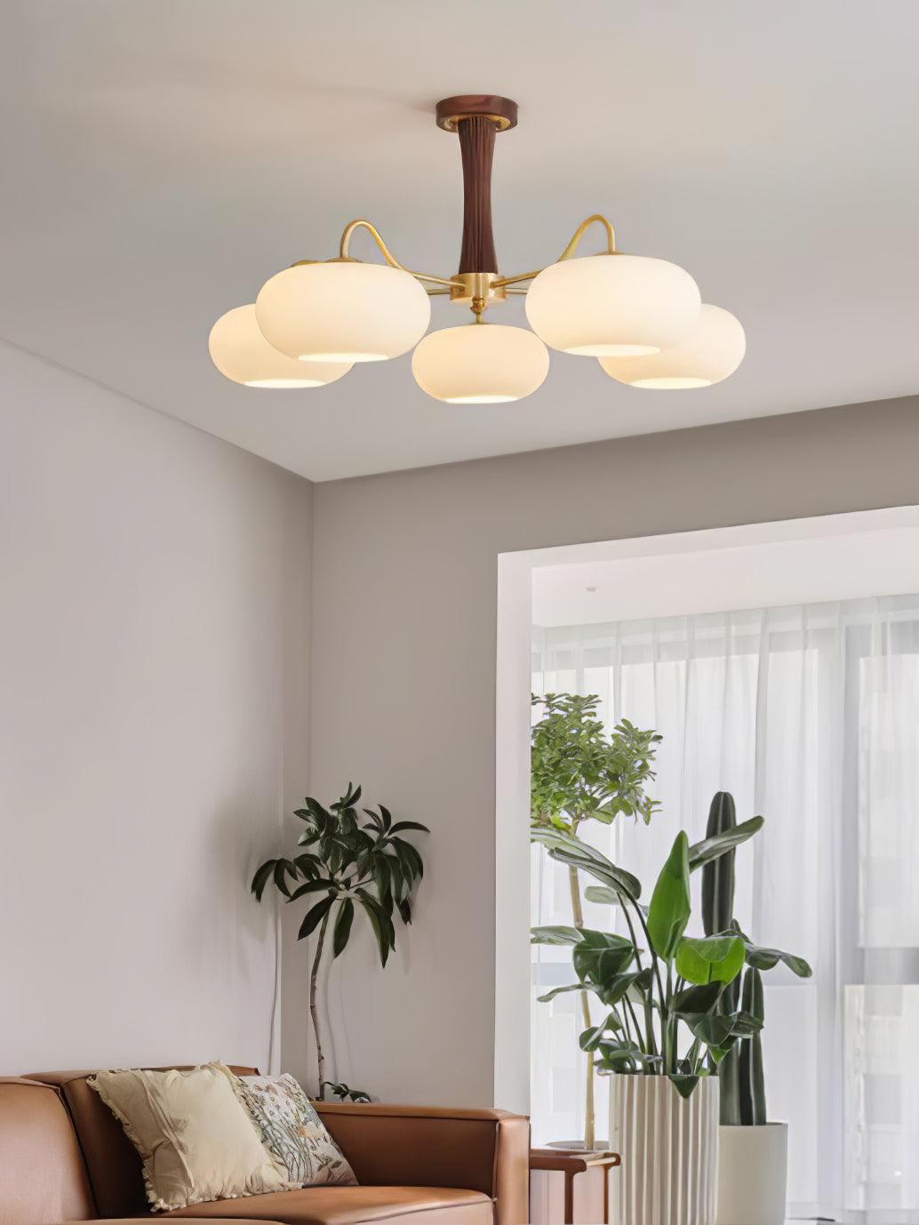 Persimmon glass chandelier with brass arms and wood accent ceiling pendant light on Tampa Home & Garden Store