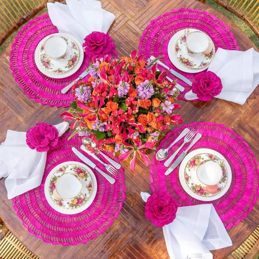 Buriti straw placemats handcrafted by Talah Home in bright pink 4pc set for sustainable dining on Tampa Home & Garden Store