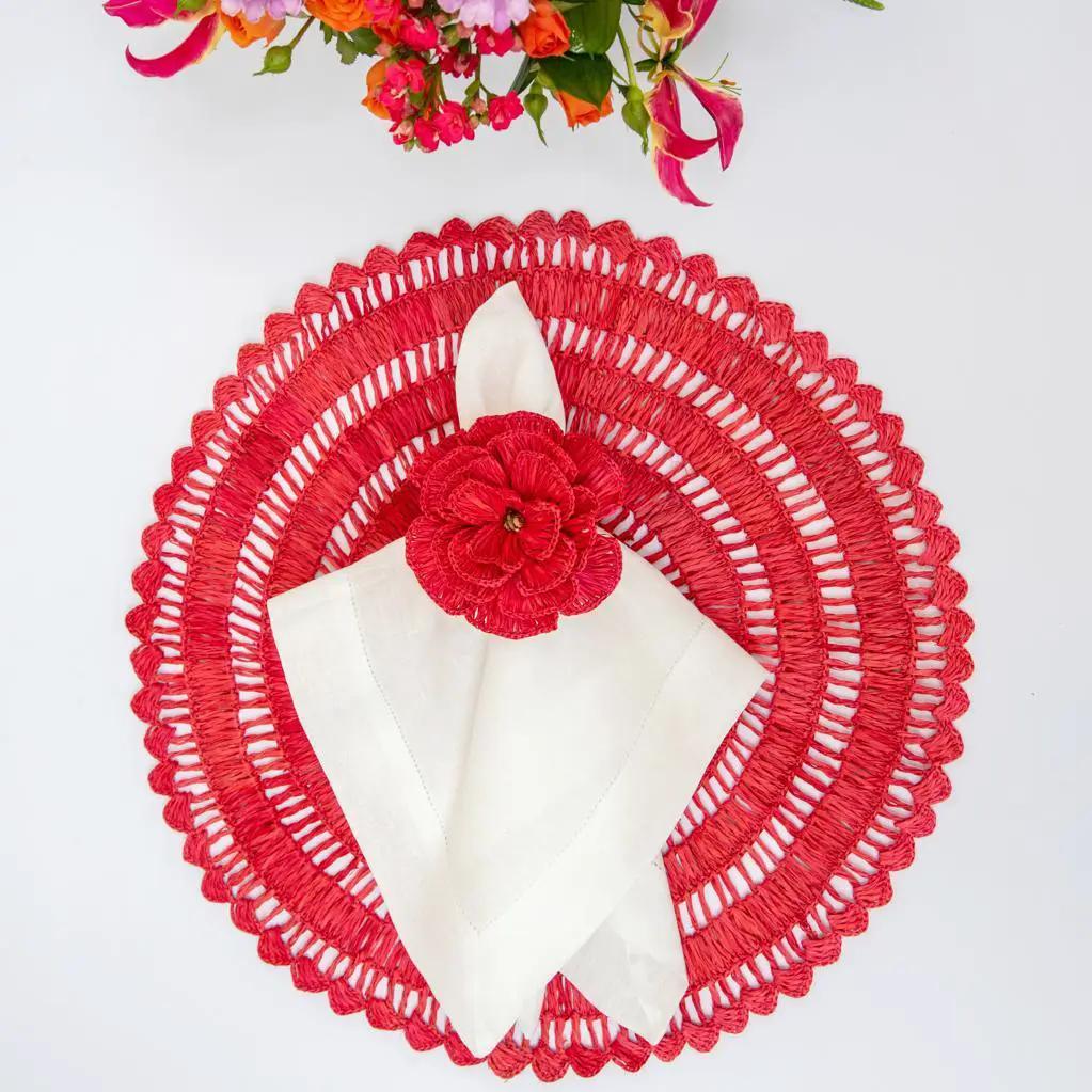 Placemats Buriti straw handcrafted, circular red woven placemat with white napkin and red flower on Tampa Home & Garden Store