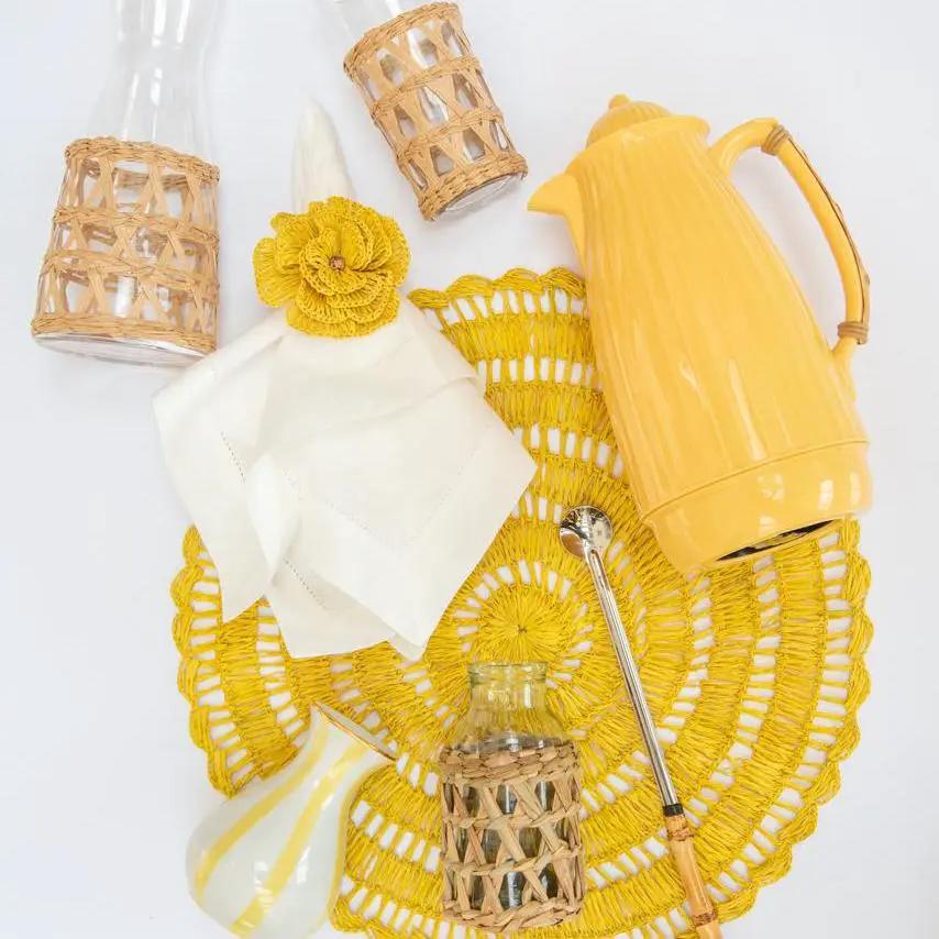 Buriti straw placemat round bright yellow handcrafted by Talah Home on Tampa Home & Garden Store