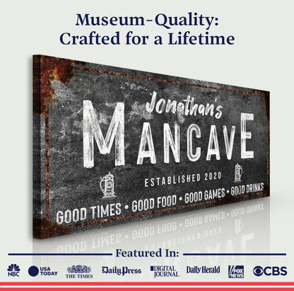 Good Times Man Cave canvas sign with distressed black surface and white lettering on Tampa Home & Garden Store