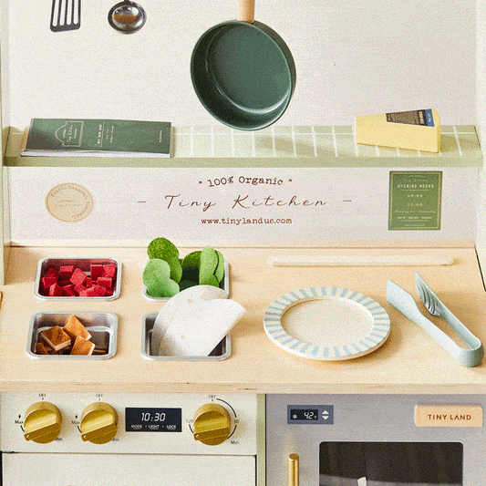 Tiny Land BistroSwitch Play Kitchen wooden countertop with metal pans & veggie pieces on Tampa Home & Garden Store