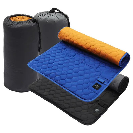 Winter heating pad for camping, blue quilted pad with orange underside, two sacks on Tampa Home & Garden Store