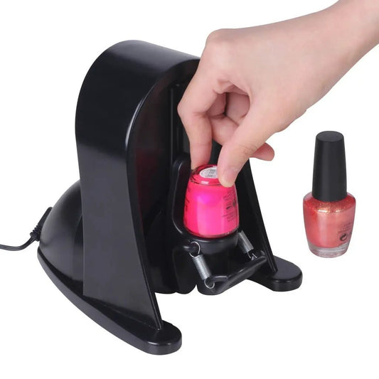 Nadico nail polish shaker device with bottle loaded in clamp beside two bottles on black base on Tampa Home & Garden Store