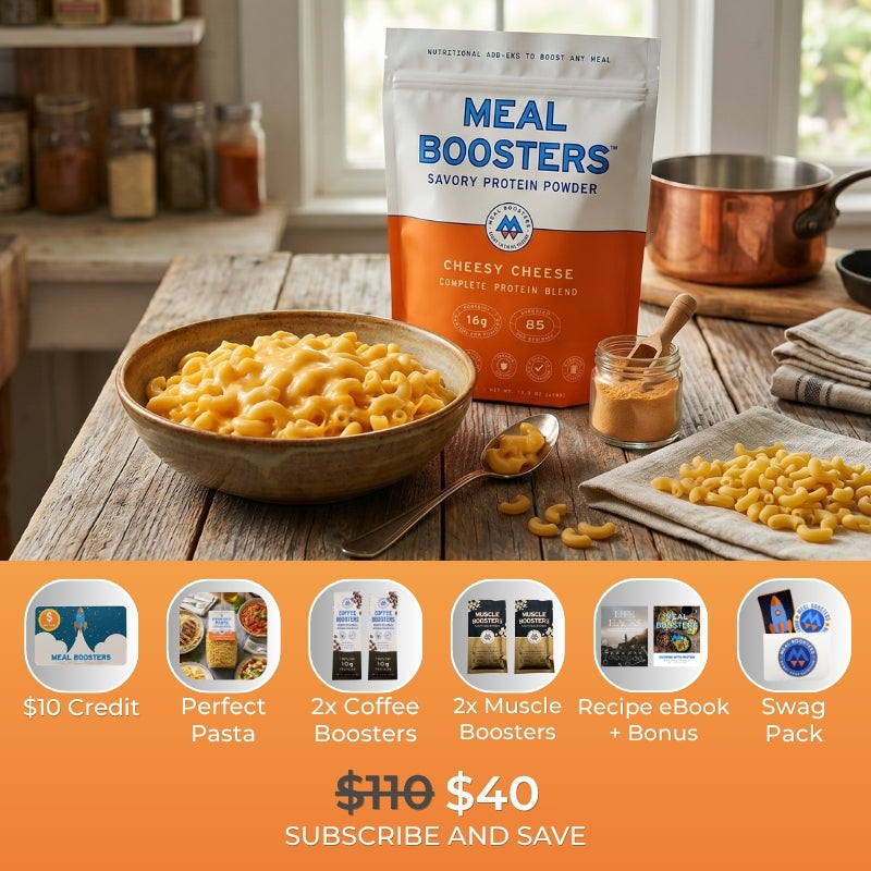 Meal Boosters Cheesy Cheese collagen+ protein powder bag in white/orange beside mac and cheese bowl on Tampa Home & Garden Store