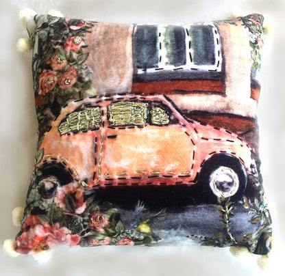 Vibhsa decorative throw pillow 12x12 with orange car motif, floral border, pom-pom trim on Tampa Home & Garden Store