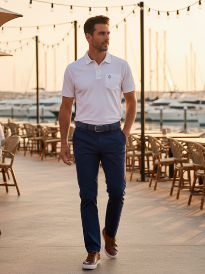 Charleston Polo White Water Life white polo with chest pocket and blue logo at marina on Tampa Home & Garden Store
