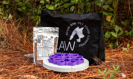 Raw Chicken & Turkey PMR meal blend for pets in foil pouch beside bag on Tampa Home & Garden Store