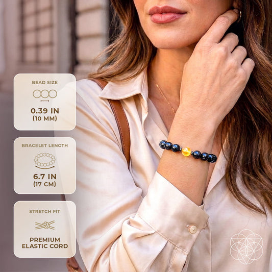 Arfvedsonite Deep Healing Bracelet for Renewal, black beads with amber accents, 6.7 in stretch on Tampa Home & Garden Store