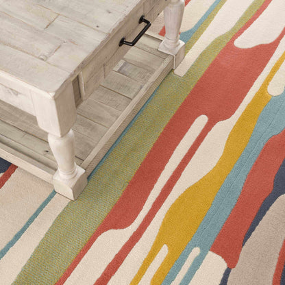 Southfields colorful modern area rug with bold stripes on light wood floor on Tampa Home & Garden Store