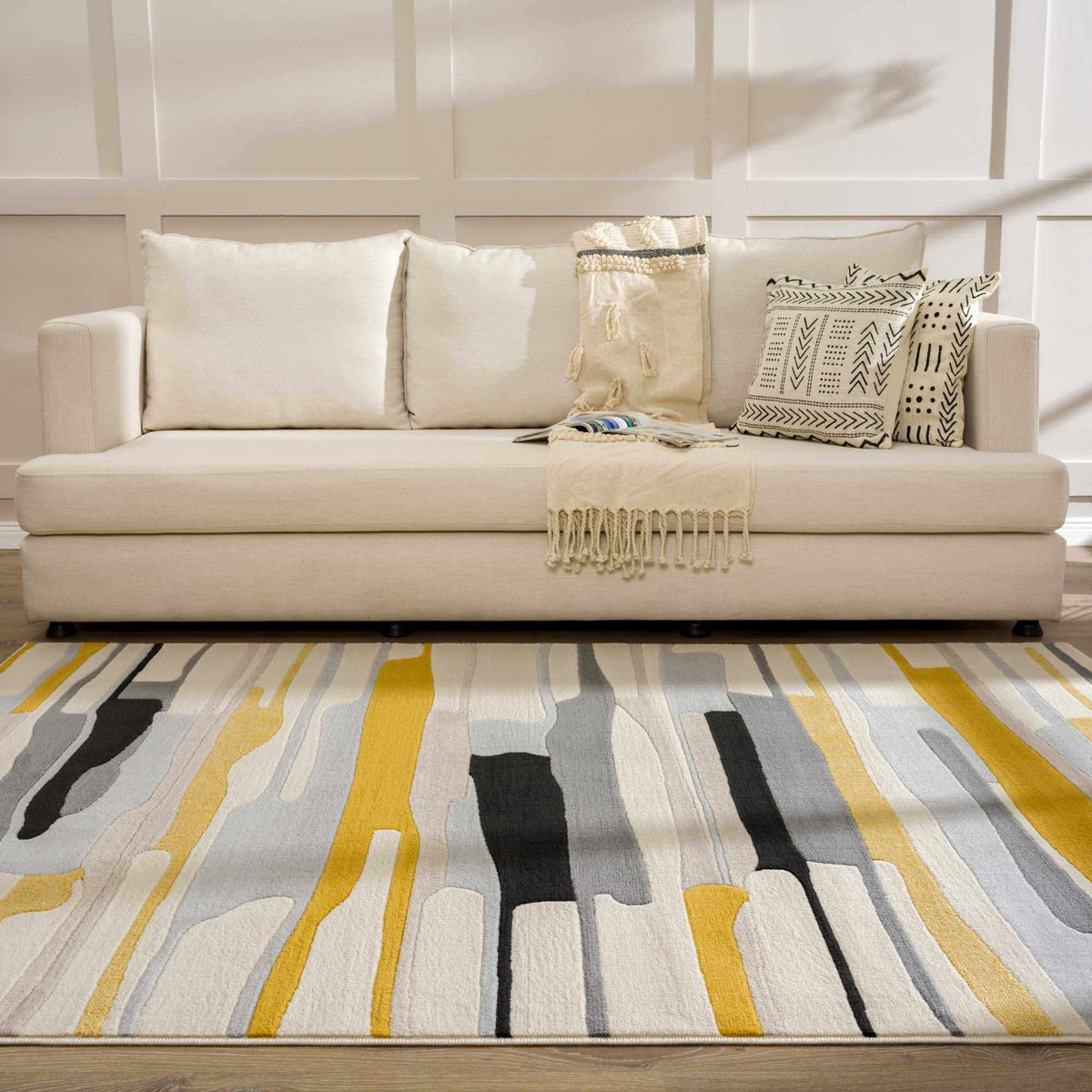 Southfields Mustard Modern Rug by Boutique Rugs with mustard yellow and black abstract stripes on Tampa Home & Garden Store