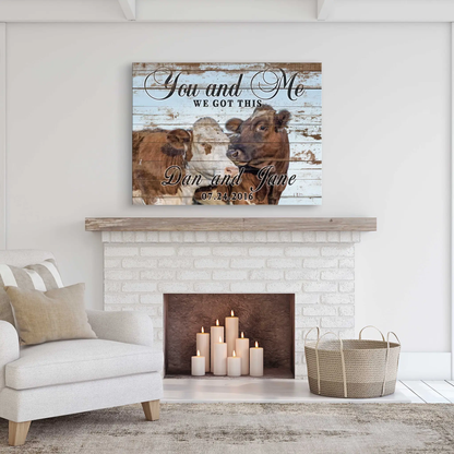 We Got This Couple Cattle Sign canvas with distressed blue wood planks and cows on Tampa Home & Garden Store