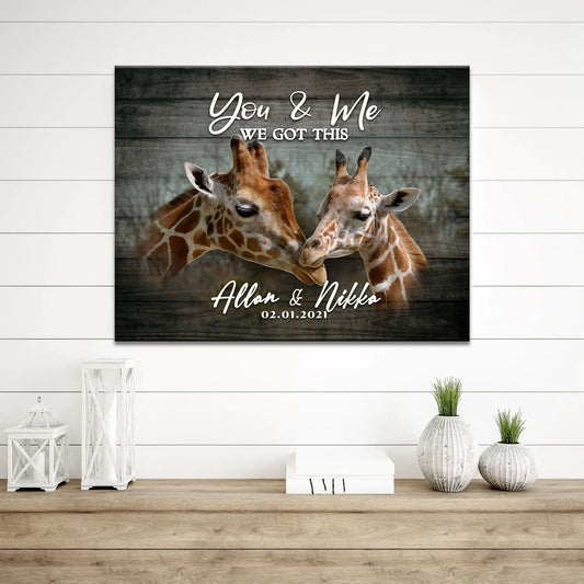 Canvas sign Tailored Canvases featuring two giraffes on wood background with You & Me We Got This on Tampa Home & Garden Store