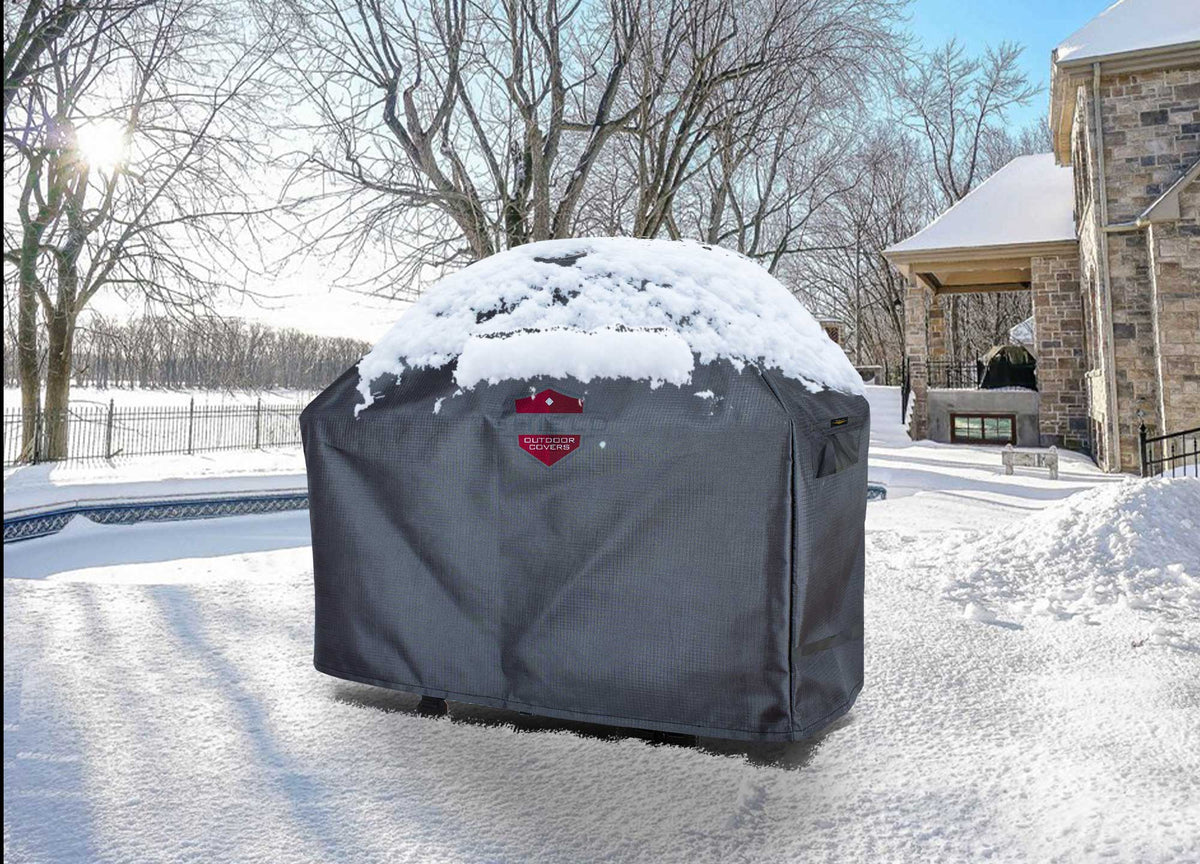 Grill Cart Cover 59x22x47.5 in dark gray Shield Outdoor Covers with red logo on snow-covered backyard on Tampa Home & Garden Store