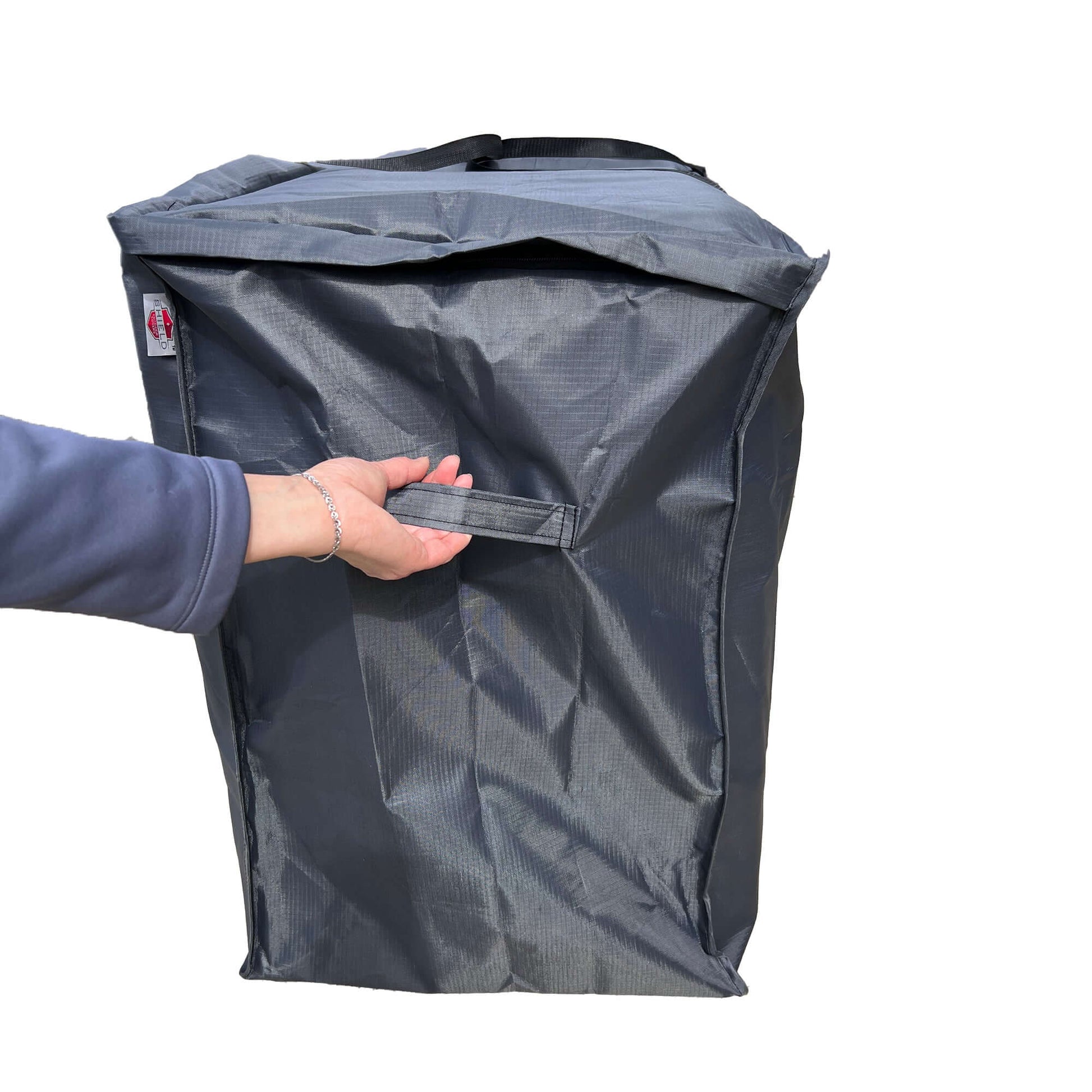 Sofa cushion bag Mercury, dark gray cushion storage bag with Shield Outdoor Covers label and strap on Tampa Home & Garden Store