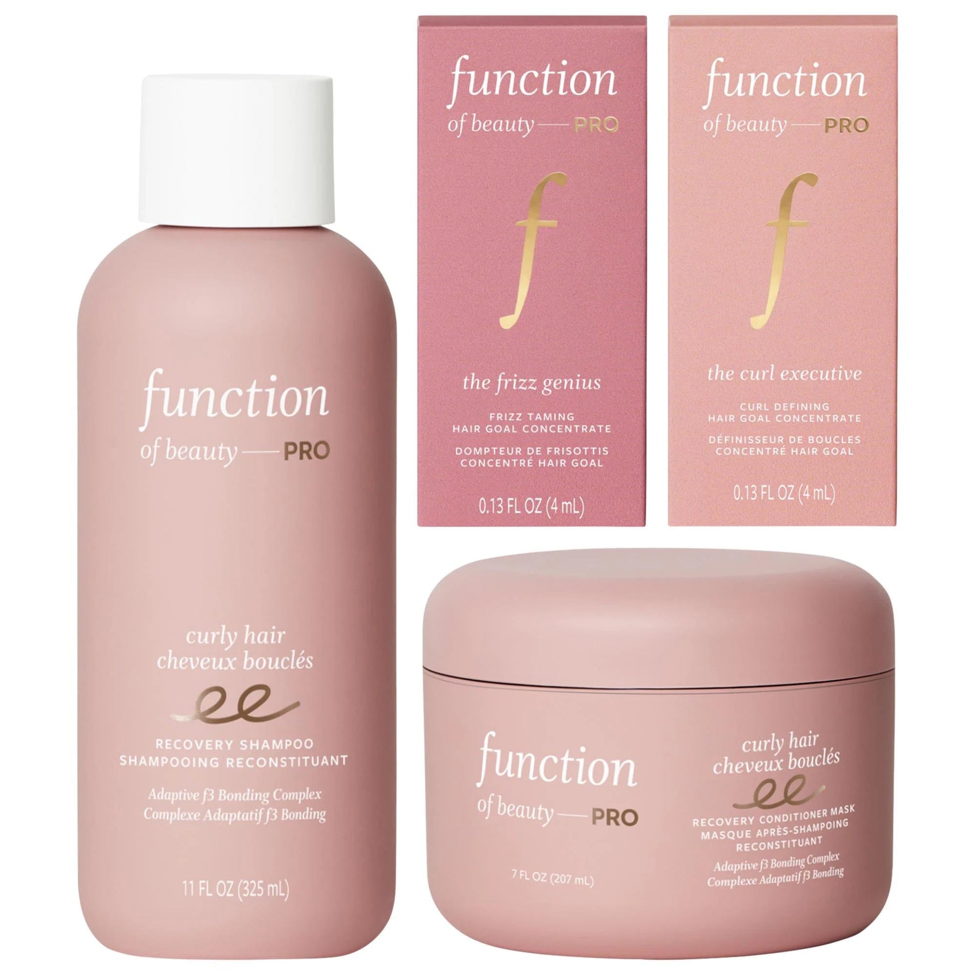 Function of Beauty Curly Hair Care Set bottle and two pink Pro boxes with gold logo on Tampa Home & Garden Store