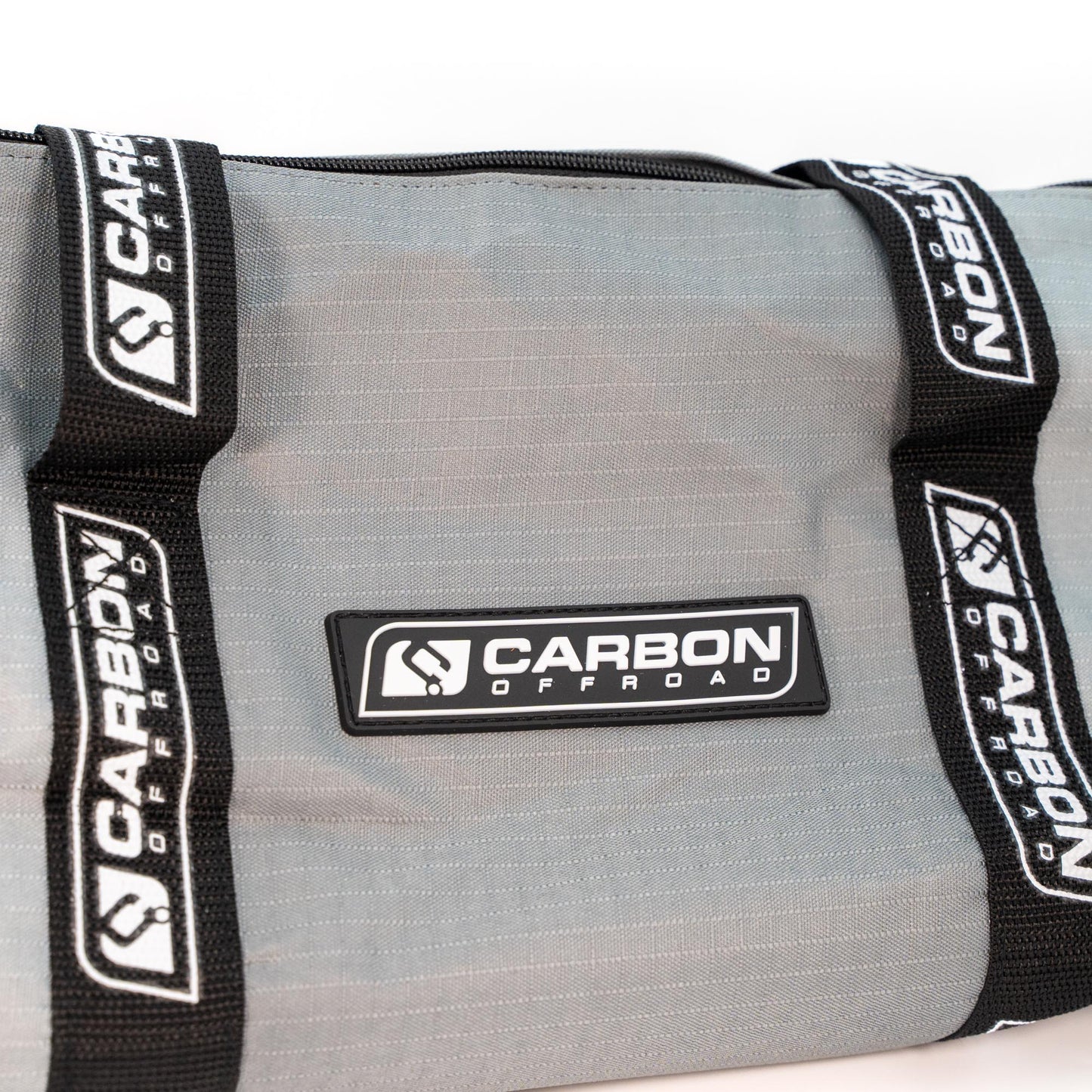 4x4 Kinetic Recovery Rope in a gray carry bag with Carbon Offroad logos on black straps on Tampa Home & Garden Store