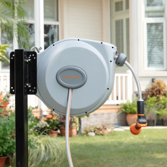 Retractable Hose Reel 65 ft 5/8 in by Giraffe Tools, gray reel on black mount with striped hose on Tampa Home & Garden Store