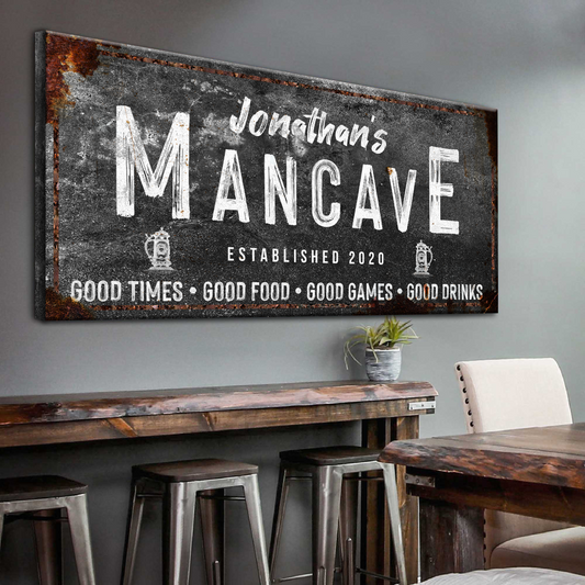 Good Times Man Cave canvas sign with distressed black surface and rust border on Tampa Home & Garden Store