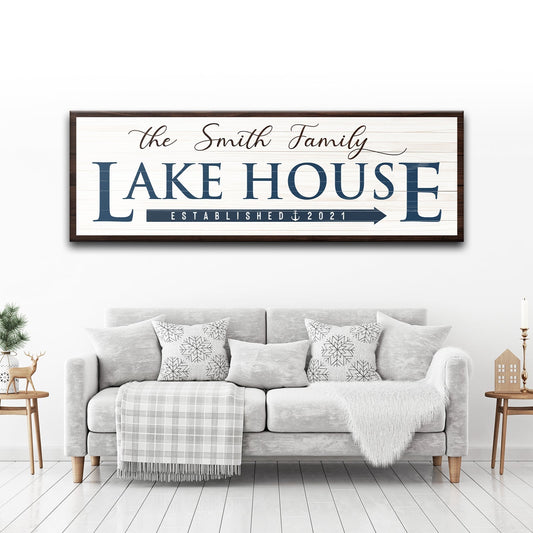 Family Lake House Arrow Sign III canvas wall art navy letters on light wood in a dark frame on Tampa Home & Garden Store