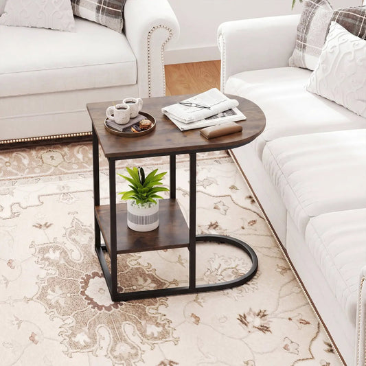 C-Shaped sofa side table with faux marble top and storage shelf, black metal frame; mugs on top, on Tampa Home & Garden Store