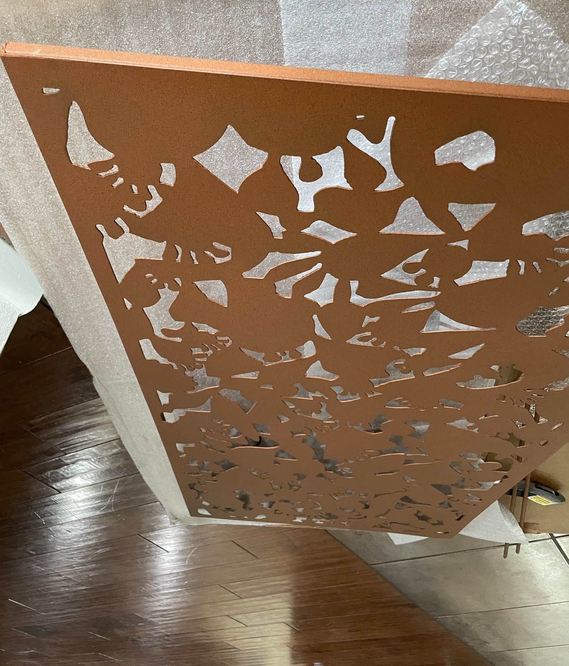 Outdoor privacy screen metal wall sculpture rust brown finish with abstract cutouts 46in by Rustica Ornamentals on Tampa Home & Garden Store