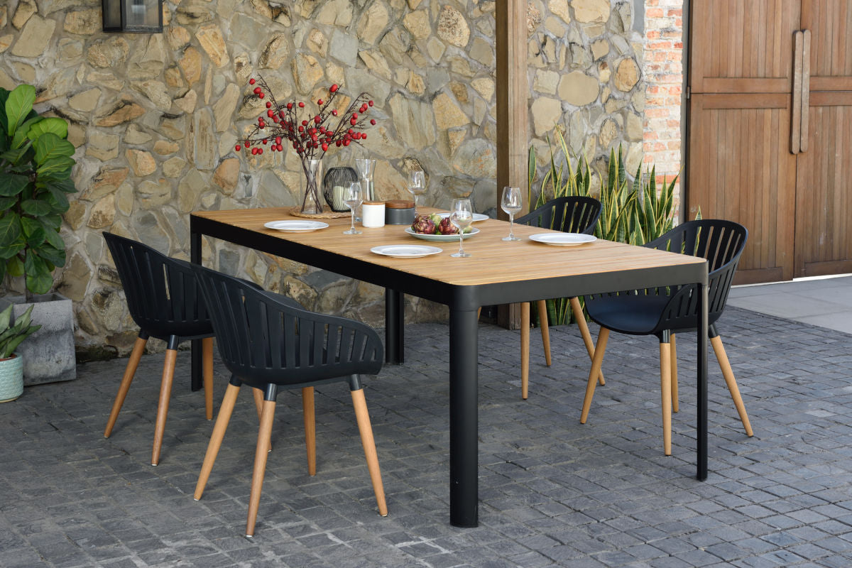 Portals Dark 4-Seater Carver Rectangular Dining Set with wood tabletop and black chairs on Tampa Home & Garden Store
