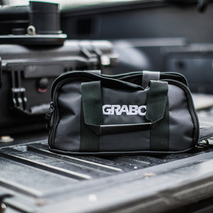 GRABO Canvas Carry Bag gray canvas tool bag with green straps and GRABO logo on front on Tampa Home & Garden Store