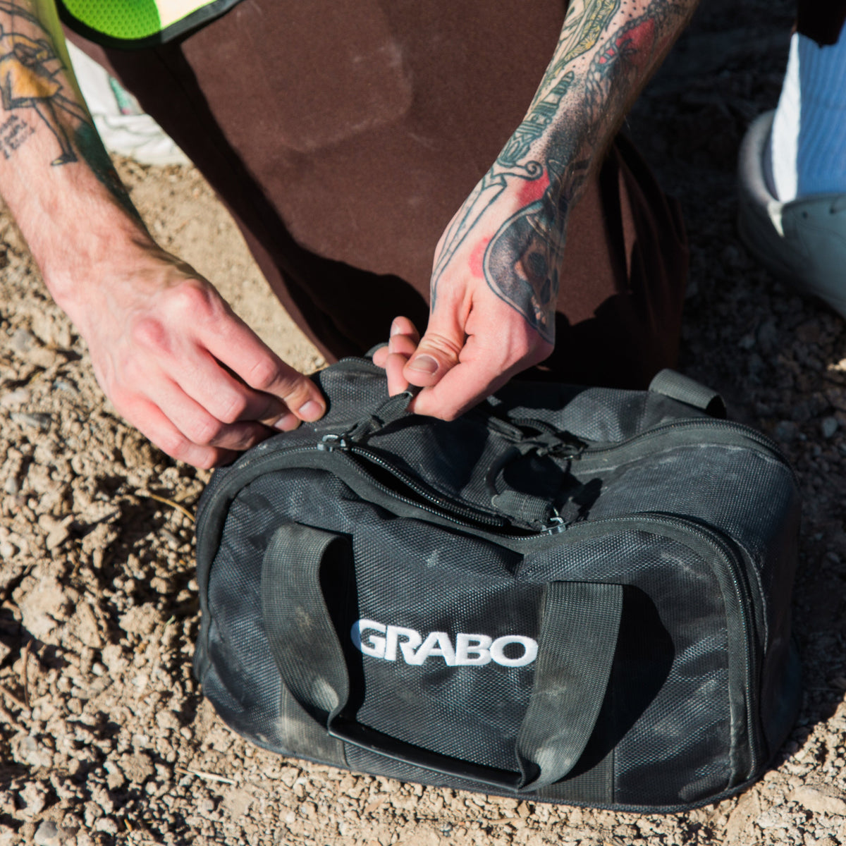 GRABO canvas carry bag, black tool bag with GRABO logo and zip pockets on Tampa Home & Garden Store