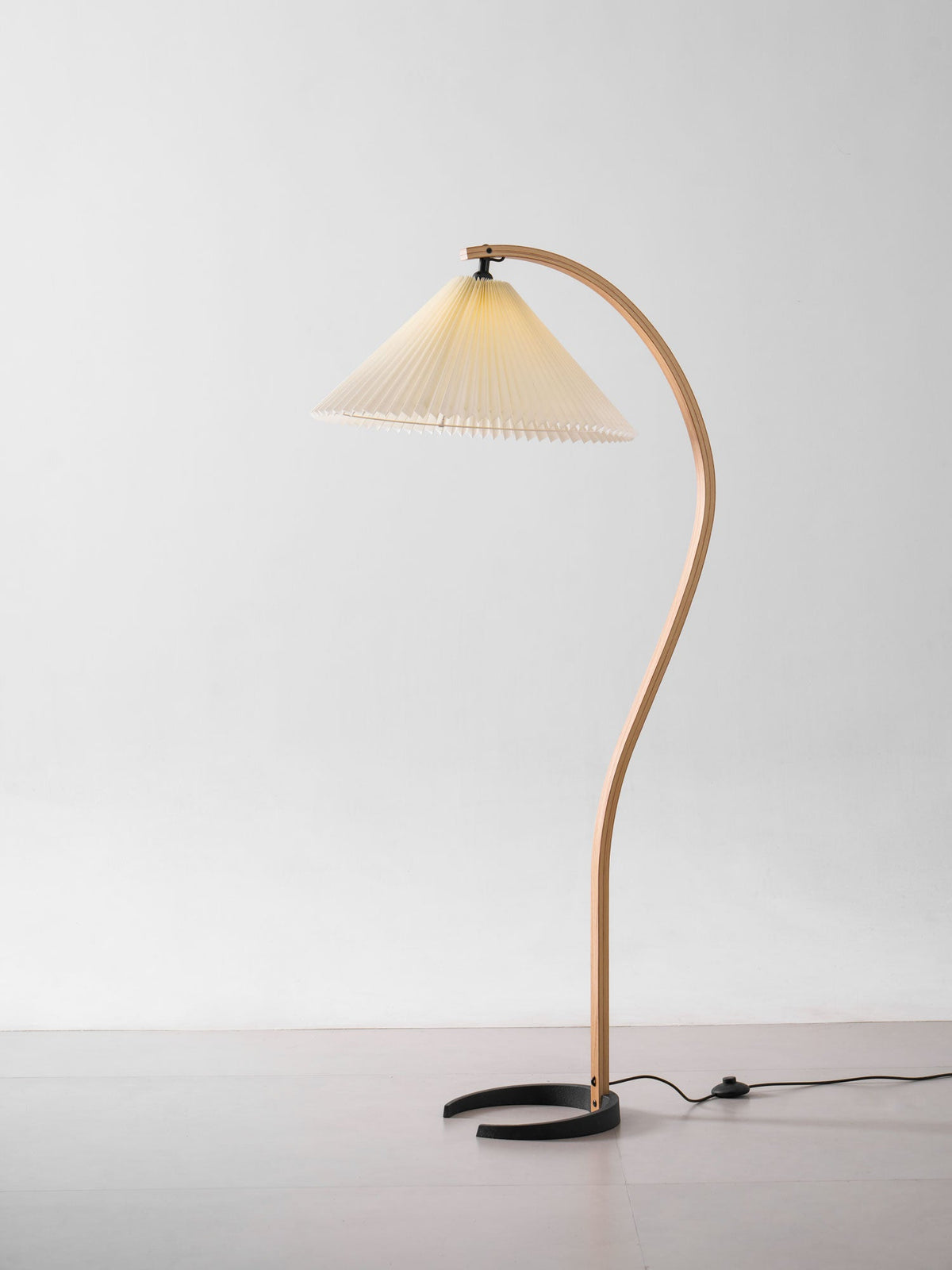 Arbora Arc floor lamp with beech wood arc and pleated shade by Moktan Sabai plug-in lamp on Tampa Home & Garden Store