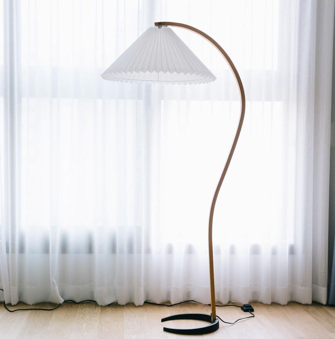 Arbora Arc floor lamp with beech wood stem and white pleated shade, plug-in lighting on Tampa Home & Garden Store