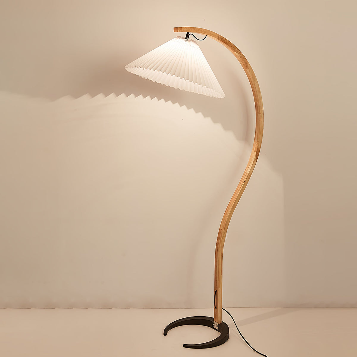 Arbora Arc Floor Lamp with beech wood arc and white pleated shade; plug-in lamp Moktan Sabai on Tampa Home & Garden Store