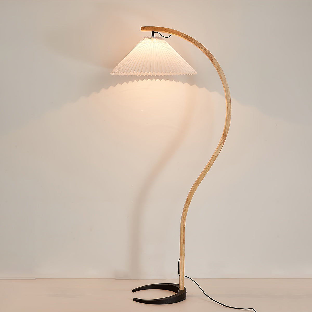 Arbora arc floor lamp in beech wood with pleated white shade by Moktan Sabai on Tampa Home & Garden Store