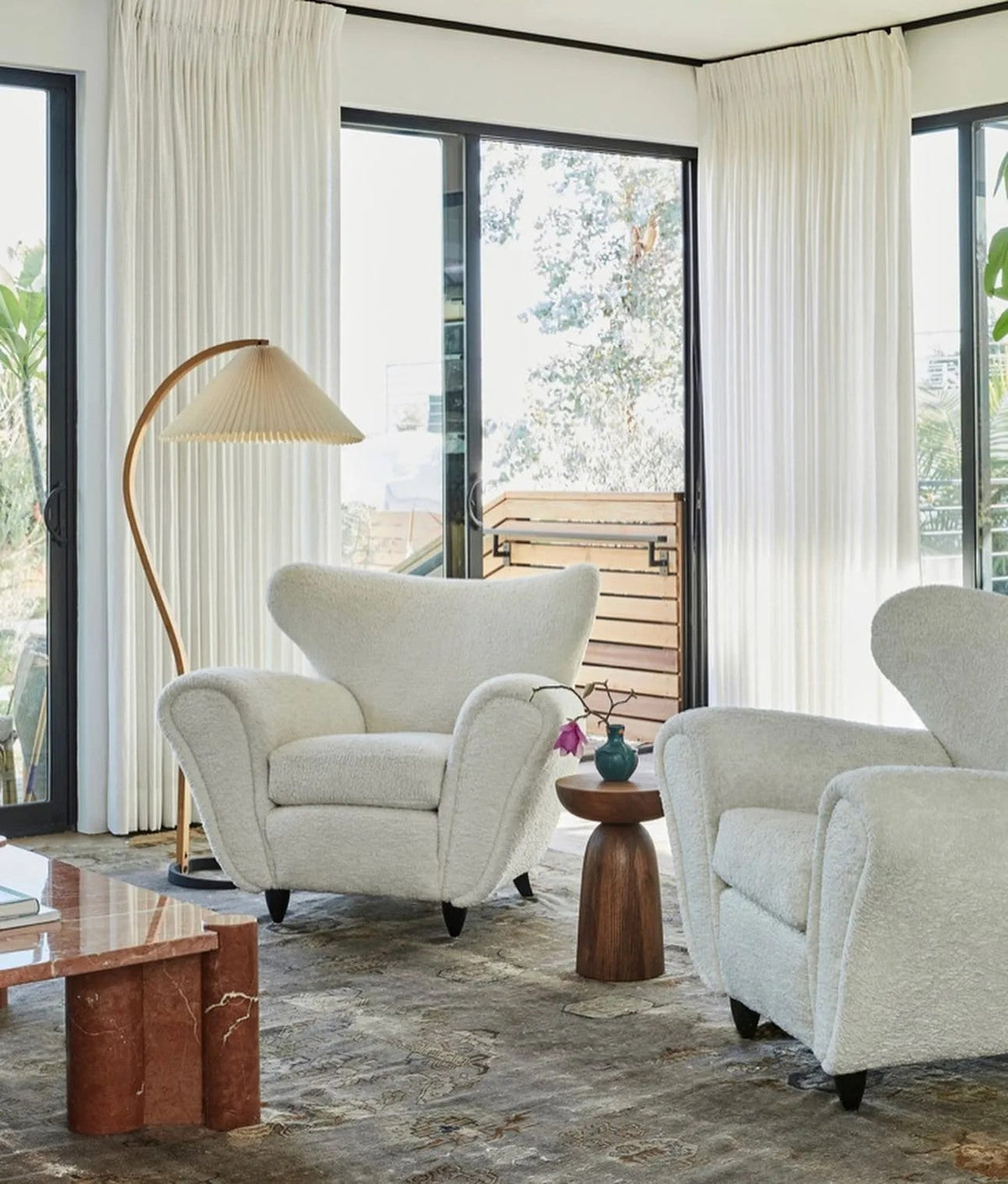Arbora Arc Floor Lamp Beech Wood with Pleated Shade Moktan Sabai in a living room by loungers on Tampa Home & Garden Store