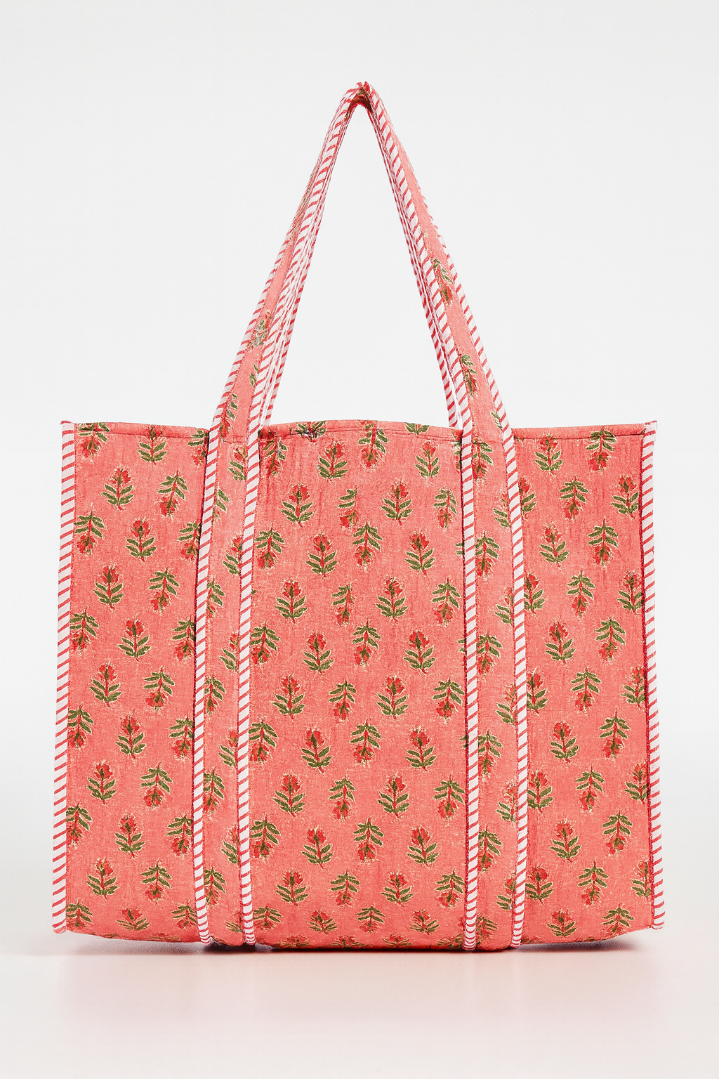 Pink field tote bag with green leaf print and striped handles by Erin Donahue Tice on Tampa Home & Garden Store